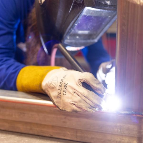 worker with a plasma torch